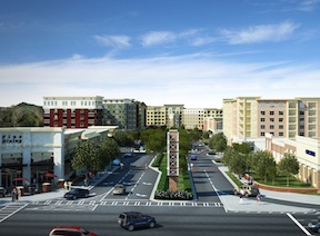 A pedestrian walks through Town Brookhaven, a mixed-use